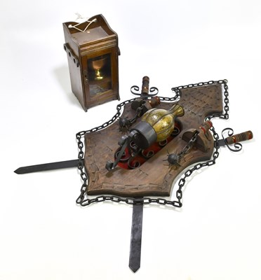 Lot 156 - A stained pine and iron wall light, the shield...