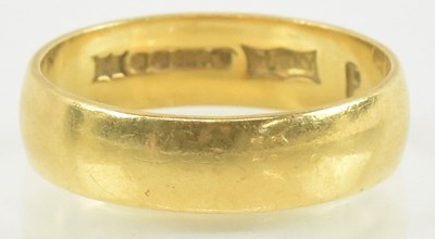 Lot 847 - A 22ct gold band ring, marked '916' to the...