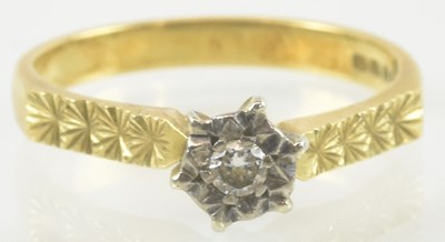 Lot 907 - An 18ct gold Edwardian style ring, with small...