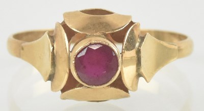 Lot 908 - An Art Deco ruby ring, with stylised head and...