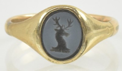 Lot 933 - A 9ct gold intaglio ring, the intaglio carved...