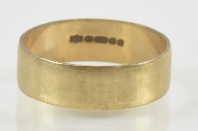 Lot 934 - A 9ct gold band ring, size P, approx 2.35g.