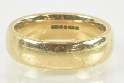 Lot 863 - A 9ct gold wide band ring, size R, approx 8.5g.