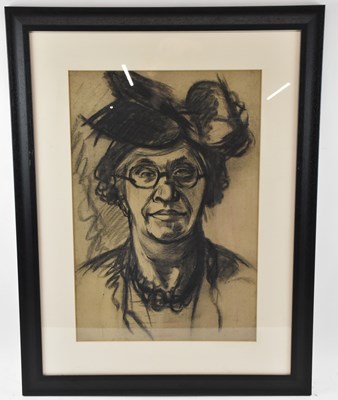 Lot 302 - ATTRIBUTED TO FRANK MCFADDEN; a charcoal...