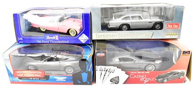 Lot 559 - Three James Bond themed collector's diecast...