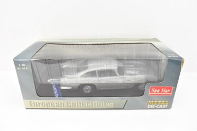 Lot 559 - Three James Bond themed collector's diecast...
