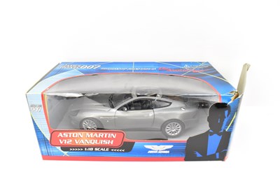 Lot 559 - Three James Bond themed collector's diecast...