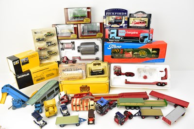 Lot 550 - Eleven boxed diecast collector's scale model...