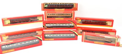 Lot 575 - HORNBY; ten boxed OO gauge railway coaches...