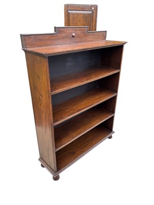 Lot 312 - A 1920s oak freestanding bookcase with three...