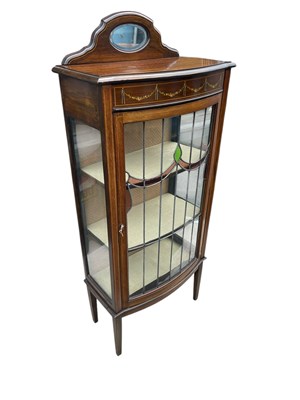 Lot 247 - An Edwardian painted bowfront display cabinet...