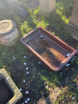 Lot 434 - A vintage salt glazed sink with scrolling...