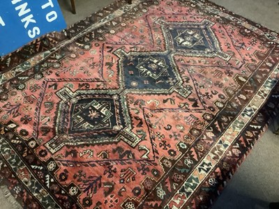 Lot 327 - An Eastern style rug with central lozenge...