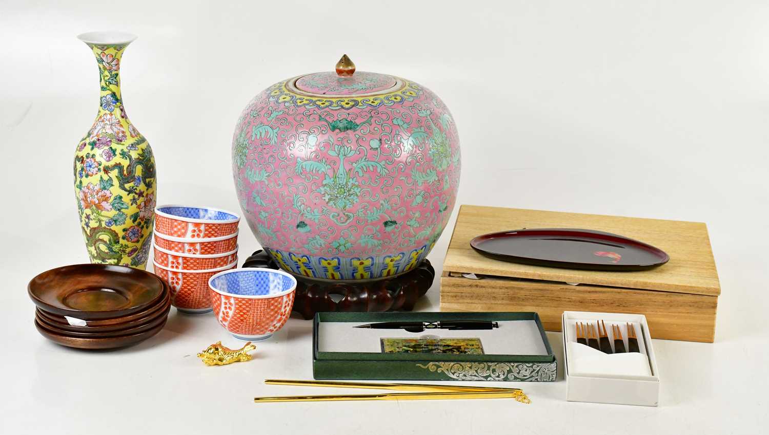 Lot 1367 - A Chinese Famille Rose bulbous jar and cover...
