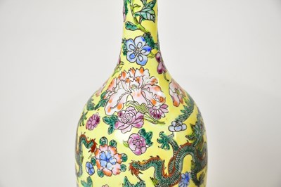 Lot 1367 - A Chinese Famille Rose bulbous jar and cover...