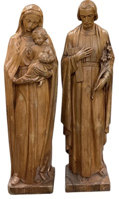 Lot 385 - Two 20th century religious wooden carvings...