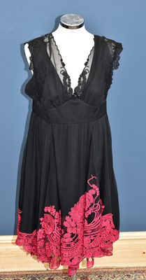 Lot 866 - KAREN MILLEN; a black 100% silk evening dress,...