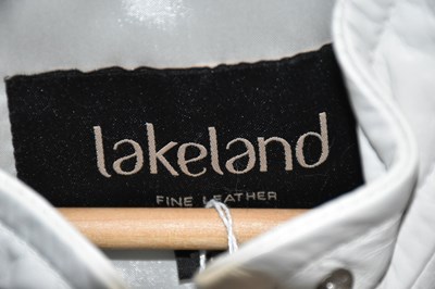 Lot 868 - LAKELAND; a white nappa leather shirt jacket...