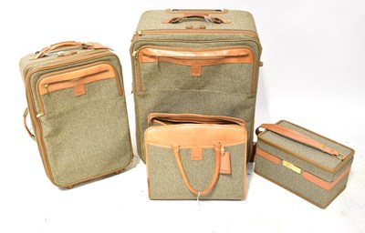 Lot 330 - HARTMANN; a four-piece luggage set in tweed...