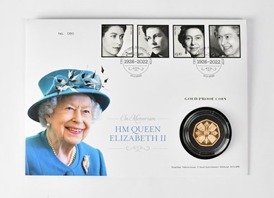 Lot 684 - An Elizabeth II gold proof 50p coin cover,...