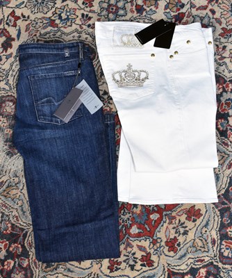 Lot 852 - FOR ALL MANKIND; a pair of blue indigo jeans,...