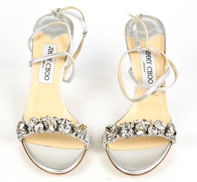 Lot 878 - JIMMY CHOO; a pair of silver leather unused...