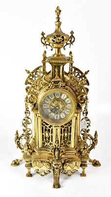 Lot 179 - A French gilt brass cased mantel clock, with...