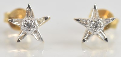 Lot 1420 - A pair of 18ct yellow gold diamond star shaped...