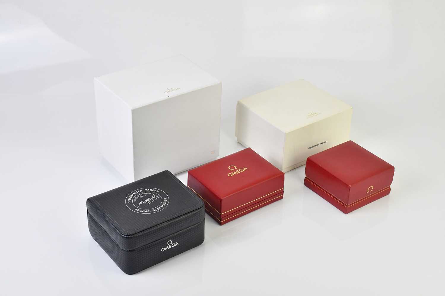 Lot 10 - OMEGA; five watch boxes including two with...