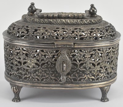 Lot 1110 - An Indian white metal pierced floral decorated...