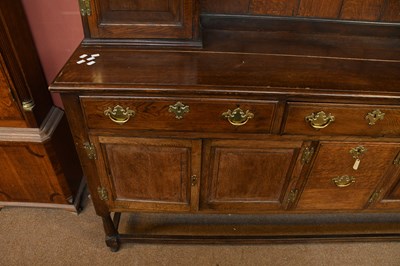 Lot 2949 - A 1920's oak dresser and plate rack with three...