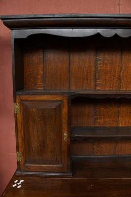 Lot 2949 - A 1920's oak dresser and plate rack with three...