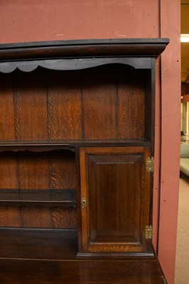 Lot 2949 - A 1920's oak dresser and plate rack with three...