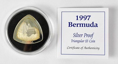 Lot 590 - A 1997 Bermuda triangular $3 silver coin, 20g,...