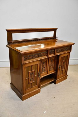 Lot 218 - An Edwardian carved oak mirror back sideboard,...