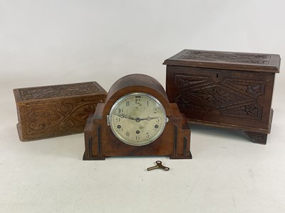 Lot 333 - An Art Deco wooden veneered mantel clock with...