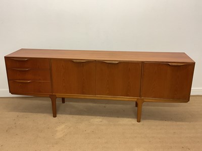 Lot 393 - MCINTOSH; a mid 20th century teak sideboard;...