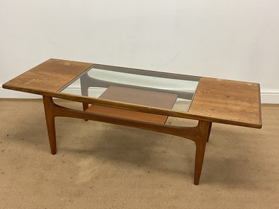 Lot 437 - G PLAN; a teak and glass coffee table with...