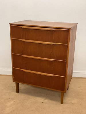 Lot 408 - A mid 20th century teak chest of four drawers...