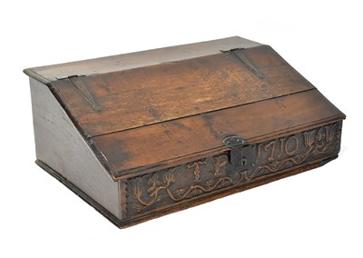 Lot 303 - An 18th century oak table-top writing slope,...