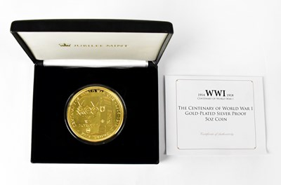 Lot 648 - A gold-plated silver proof commemorative coin,...