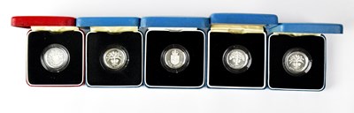 Lot 620 - Five silver proof £1 coins, 1983, two 1984,...