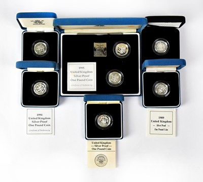 Lot 622 - Seven silver proof £1 coins, 1986, 1989, 1994,...