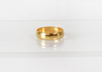 Lot 753 - A 9ct yellow gold wedding band, size V, approx....