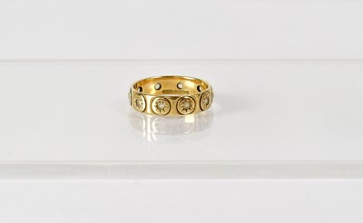 Lot 754 - A 9ct yellow gold ring set with tiny white...