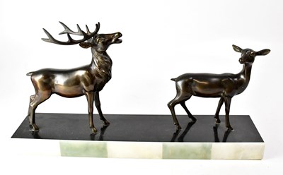 Lot 268 - A bronzed spelter figure group of a stag and a...