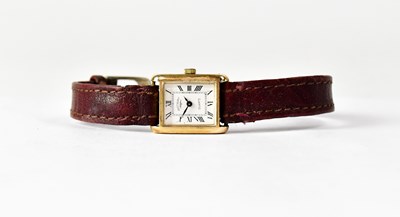 Lot 824 - ROTARY; a 9ct yellow gold tank watch, the...