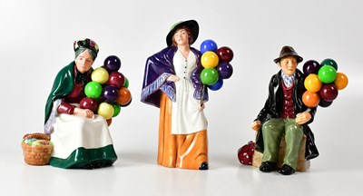 Lot 195 - ROYAL DOULTON; three figures, comprising...