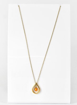 Lot 777 - A 1960s 22ct gold teardrop-shaped pendant...