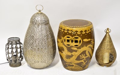 Lot 318 - Three pierced metal lanterns of various...